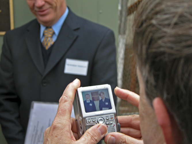 Photograph of photographer reviewing photograph