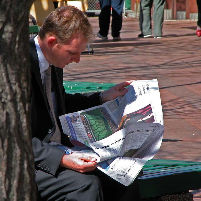 Catching up with the world's news in the lunchtime sun