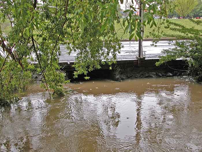 Creek with water level higher than previous day