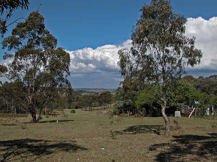 Clouds over rural landscape